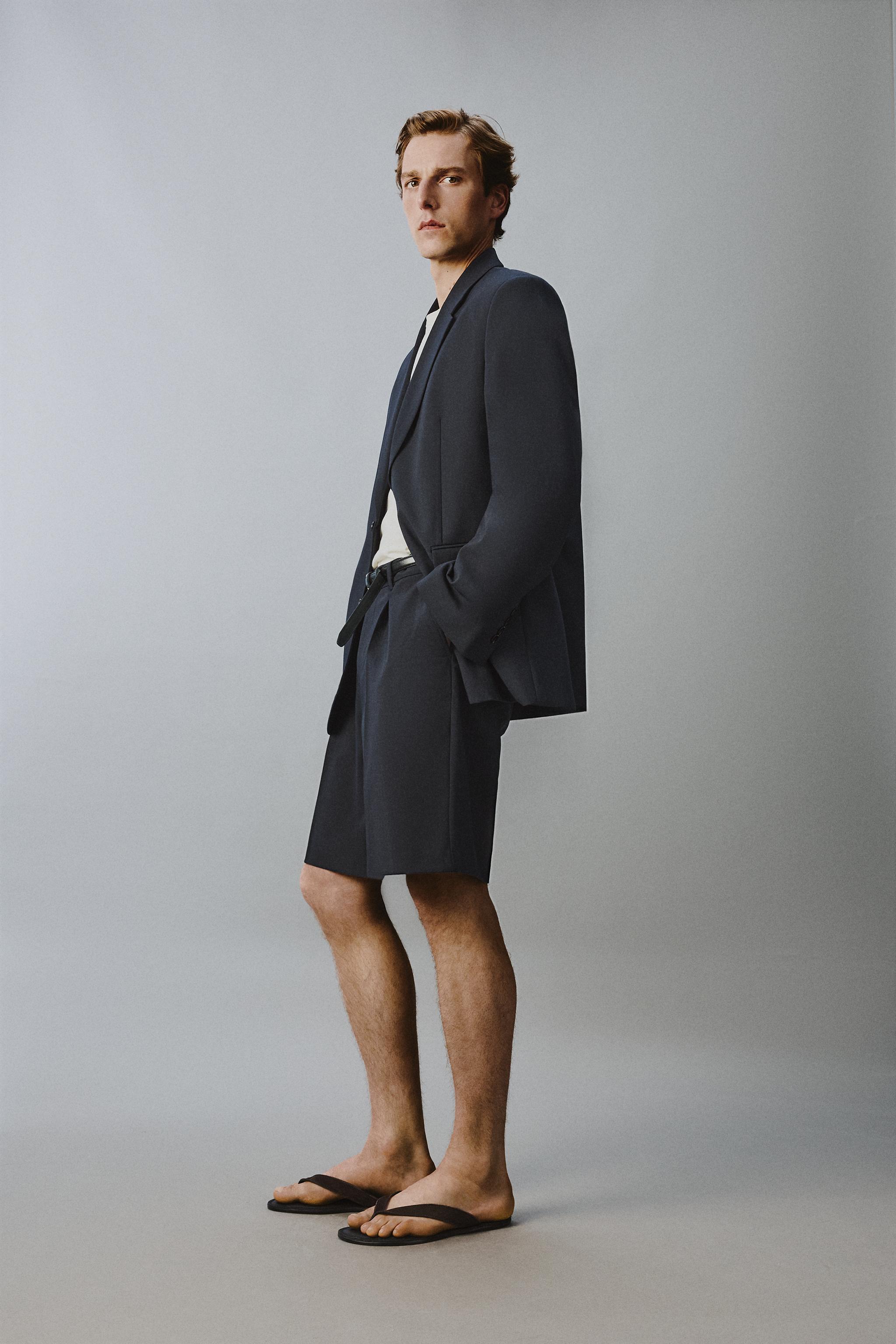 RELAXED FIT PLEATED SUIT SHORTS